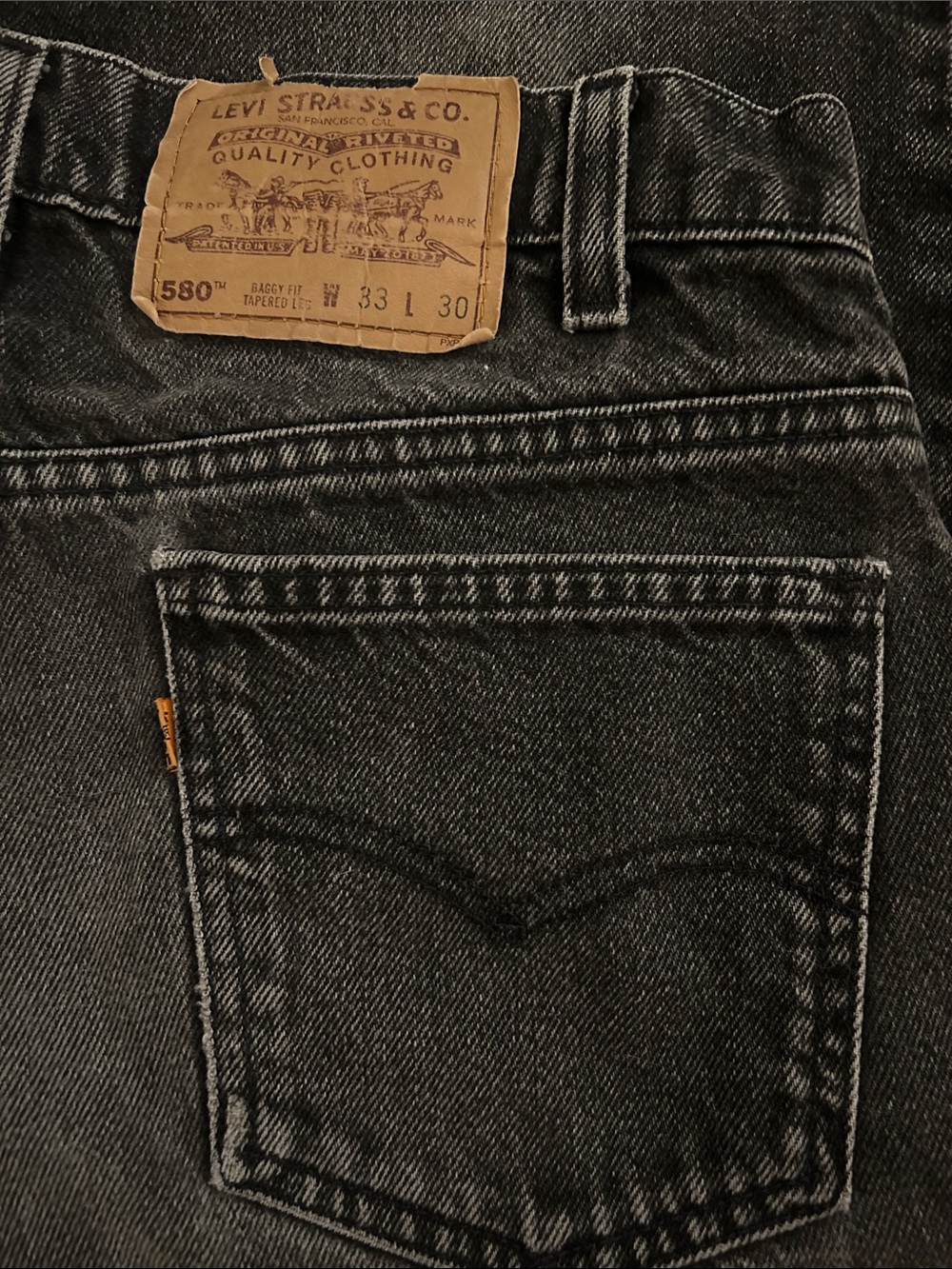 Levi's 580 Pleated Vintage Orange Tab Relaxed Fit Jeans — Washed Black Denim